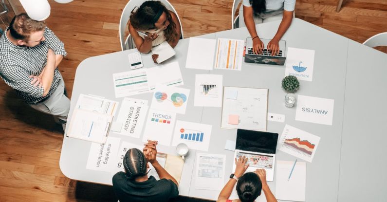 Internship To Job - People in the Office Discussing a Project