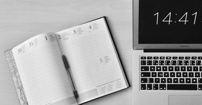 Clock Laptop - Flat Lay Photography of Unfold Book Beside Macbook