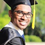 Graduation Cap - Man Wearing Black Graduation Gown and Cap