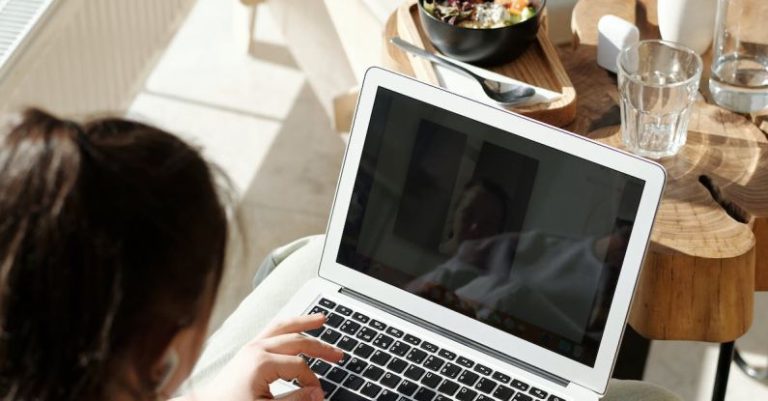 Freelancer Laptop - Woman Working at Home