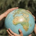 Globe Hands - People Holding a Globe