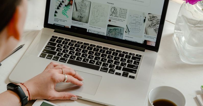 Volunteer Experience - Person Using Macbook Pro on Table