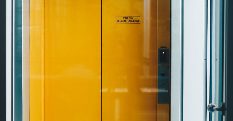 Elevator Pitch - Closed Yellow Elevator Door