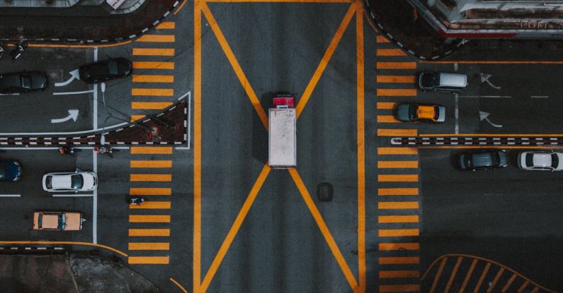 Cross-cultural Work - Aerial Photography of Cars on the Road