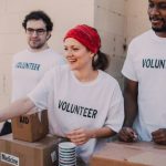 Social Impact - Three People Donating Goods