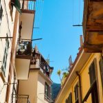 Post-interview - A narrow alley with balconies and windows