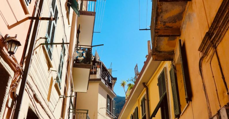 Post-interview - A narrow alley with balconies and windows