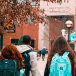 College Campus - People Wearing Backpacks